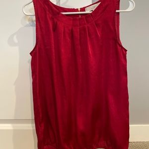 Red sleeveless blouse